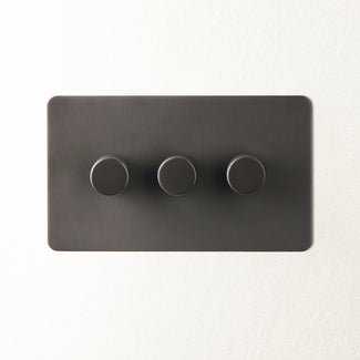 Lucian three gang dimmer switch in bronze