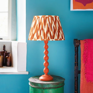 Lillee table lamp in wood with a orange finish