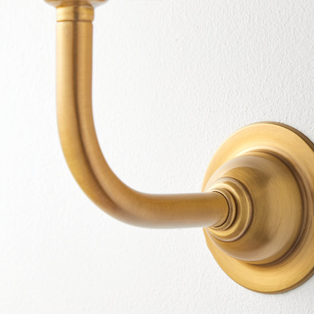 Minnow Wall Fitting in Antique Brass